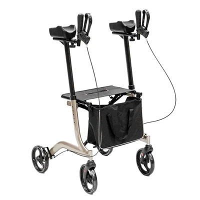 A warm silver gutter walker with padded forearm supports, handlebars, wheels, brakes for stability, and a black basket at the front for storage.